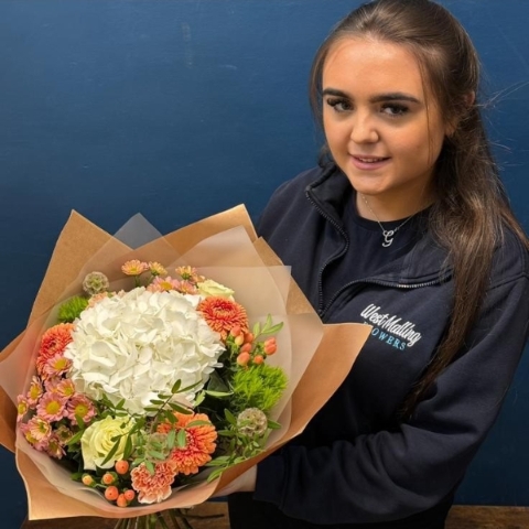 Grace’s florist designed just because bouquet in soft seasonal tones