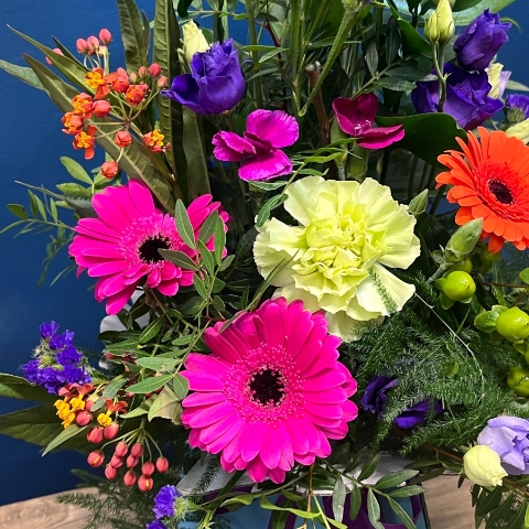 bright mixed flower arrangement in blue gift box West Malling Flowers