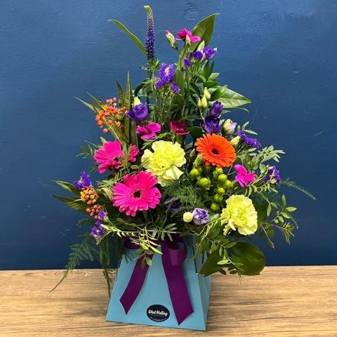 bright mixed flower arrangement in blue gift box West Malling Flowers