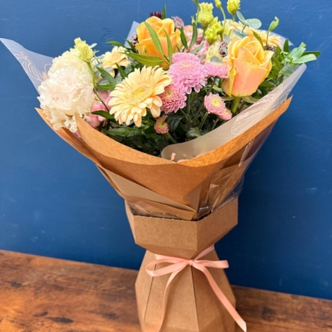 Rich toned Rome hand tied bouquet for Mother’s Day with seasonal flowers and foliage, West Malling florist delivery