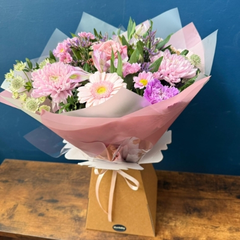 Soft pastel Paris hand tied bouquet for Mother’s Day with pink and lilac seasonal flowers, West Malling flower delivery