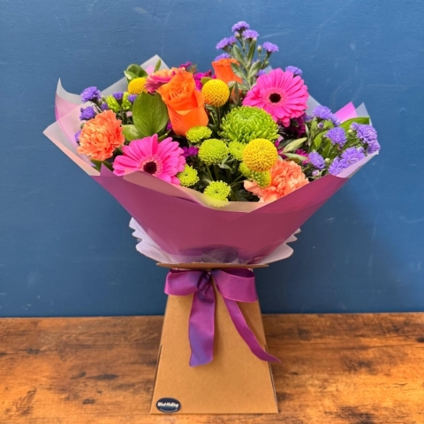 Bright New York hand tied bouquet for Mother’s Day with colourful seasonal flowers, West Malling florist delivery