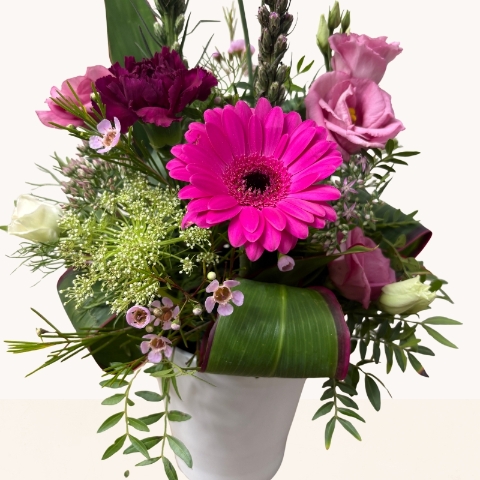 Summer Splash ceramic pot arrangement with vibrant pink and purple seasonal flowers by West Malling Flowers