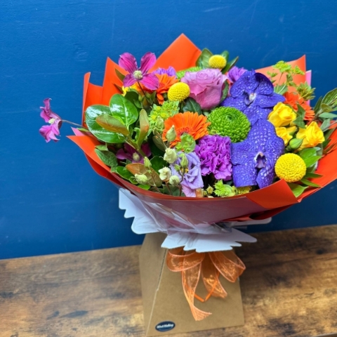 Deluxe bright hand tied Mother’s Day bouquet in the New York collection with vibrant seasonal flowers, West Malling florist