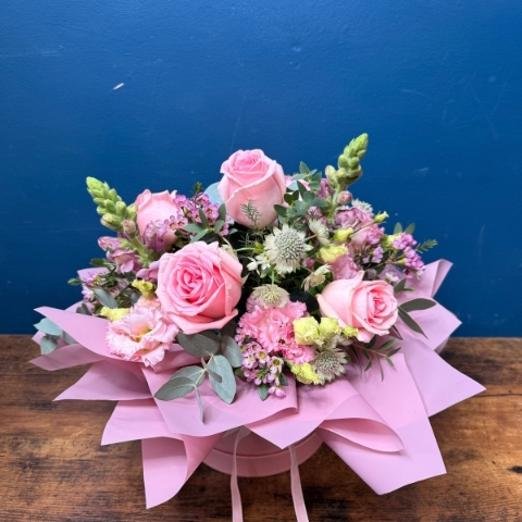 Pink hat box flower arrangement for Mother’s Day with romantic pastel seasonal flowers, Paris collection West Malling florist