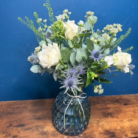 Mother’s Day flowers arranged in a blue glass vase with fresh seasonal flowers, London collection West Malling florist