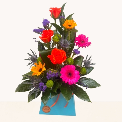 Summer Splash vibrant flower box arrangement with bright pink, orange, purple and blue seasonal flowers