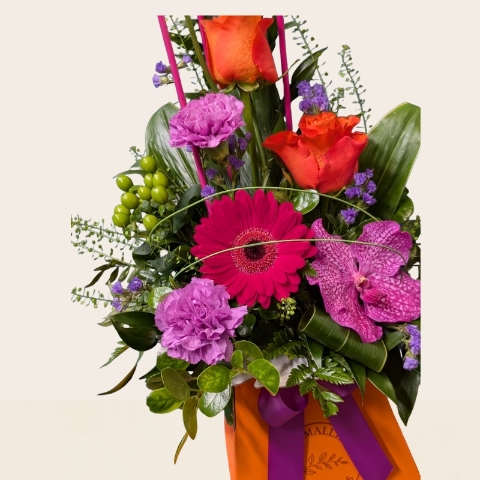 Summer flower box arrangement with pink lilac and purple seasonal flowers