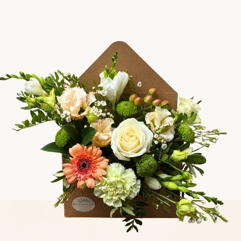Summer Glow flower envelope with peach, cream, white and green seasonal flowers with optional chocolates
