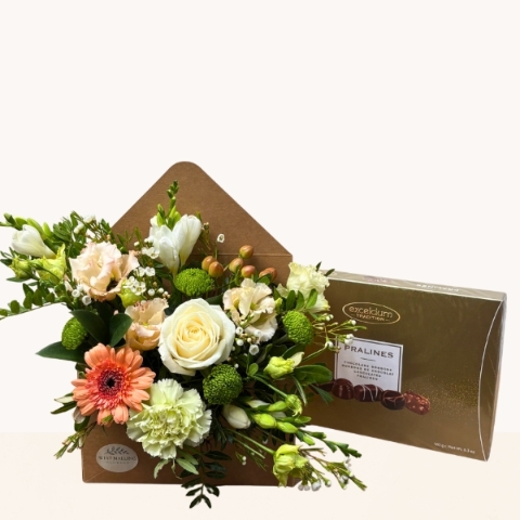 Summer Glow flower envelope with peach, cream, white and green seasonal flowers with optional chocolates