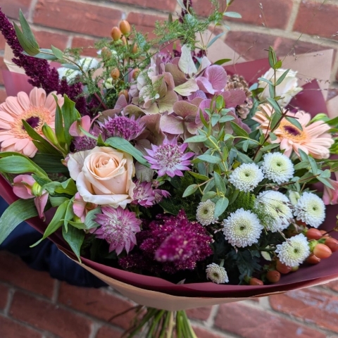 Autumn Haze hand-tied bouquet with peach, blush, bronze and burgundy seasonal flowers