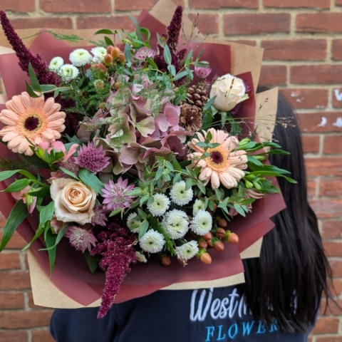 Autumn Haze hand-tied bouquet with peach, blush, bronze and burgundy seasonal flowers
