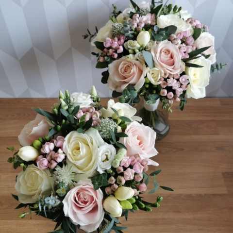 Pastel bridesmaid bouquet with soft pink and ivory flowers
