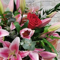 rose and lily Valentine’s bouquet arranged by West Malling Flowers