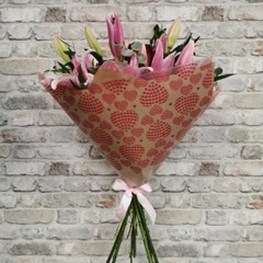 rose and lily Valentine’s bouquet arranged by West Malling Flowers